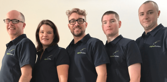 Team DF staff in company colours – Craig, Cath, Morgan, James, Daniel conga